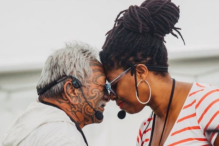 Jax Hamilton sharing a hongi, a traditional Maori greeting, at a New Zealand cultural event